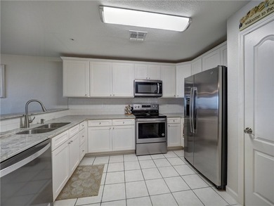 This beautifully updated 2-bedroom, 2-bath beachfront top floor - photo 7
