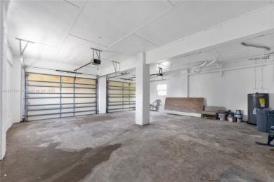 **SHORT SALE!** Light-filled corner home on the Caloosahatchee