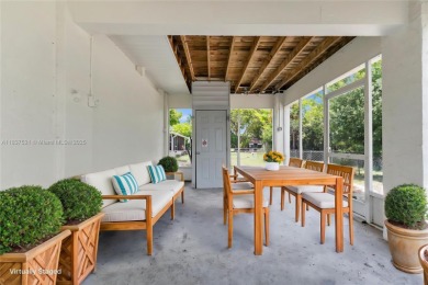 **SHORT SALE!** Light-filled corner home on the Caloosahatchee