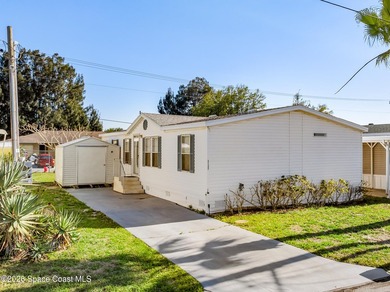 Enjoy this charming 3-bed, 2-bath home in Palm Bay Estates, a - photo 1