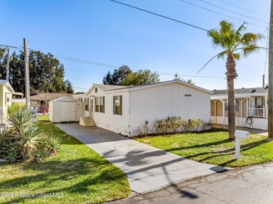 Enjoy this charming 3-bed, 2-bath home in Palm Bay Estates, a - photo 2