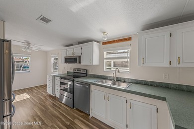 Enjoy this charming 3-bed, 2-bath home in Palm Bay Estates, a - photo 9