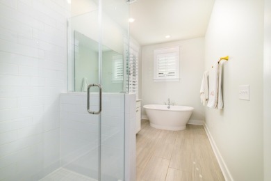 Welcome to this stunning 3-bedroom, 3.5-bathroom corner unit