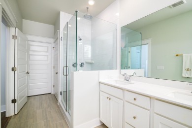 Welcome to this stunning 3-bedroom, 3.5-bathroom corner unit