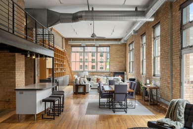 Located in the historic 801 lofts, this authentic loft offers a - photo 1