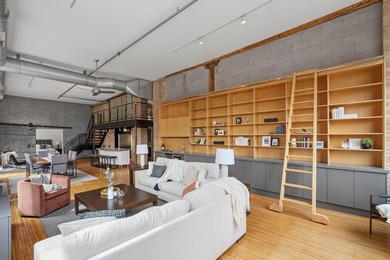 Located in the historic 801 lofts, this authentic loft offers a - photo 3