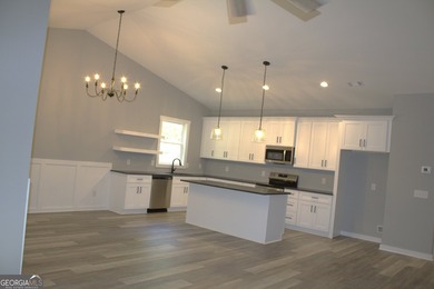DRASTIC REDUCTION. HOME WAS ORGINALLY $335,000. This home is - photo 4