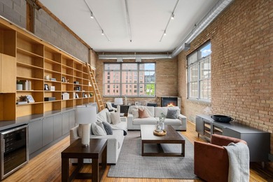 Located in the historic 801 lofts, this authentic loft offers a - photo 4