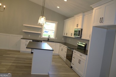DRASTIC REDUCTION. HOME WAS ORGINALLY $335,000. This home is - photo 5