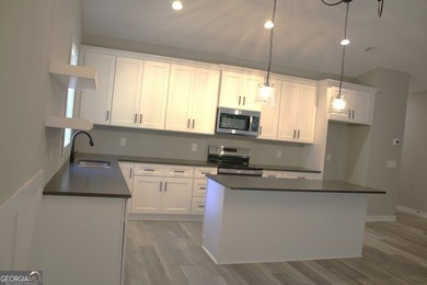 DRASTIC REDUCTION. HOME WAS ORGINALLY $335,000. This home is - photo 6