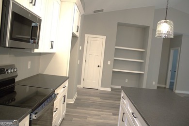 DRASTIC REDUCTION. HOME WAS ORGINALLY $335,000. This home is - photo 7