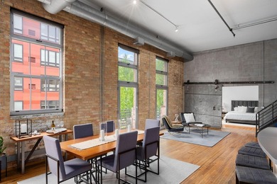 Located in the historic 801 lofts, this authentic loft offers a - photo 7