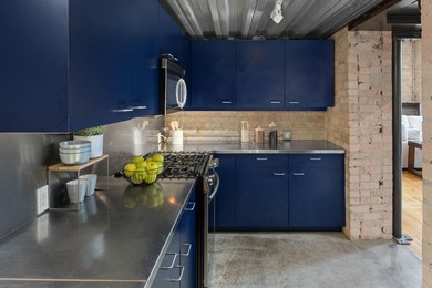 Located in the historic 801 lofts, this authentic loft offers a - photo 9