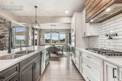 Located in the Kings Deer community, this custom two story home - photo 9