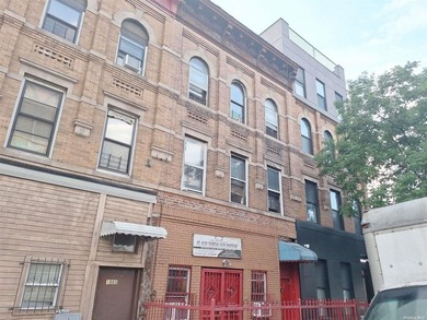 This Mixed Use Building Features 2 Kitchens, 4 Bedrooms, 3 Full - photo 1