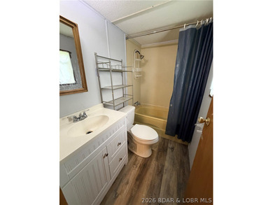 Affordable Lake Living Opportunity in the desirable Osage - photo 14