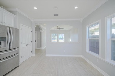 This stylishly crafted home in desirable Sea Oaks Village - photo 9