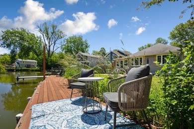 Waterfront Living with Direct Chain O' Lakes Access! Nestled - photo 3