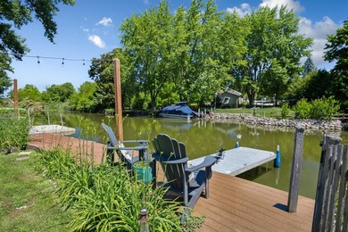 Waterfront Living with Direct Chain O' Lakes Access! Nestled - photo 4