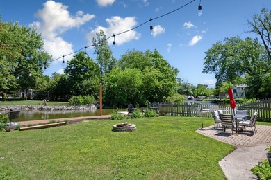 Waterfront Living with Direct Chain O' Lakes Access! Nestled - photo 5