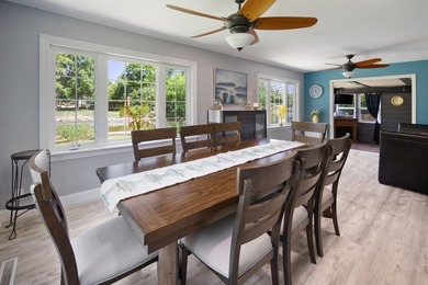 Waterfront Living with Direct Chain O' Lakes Access! Nestled - photo 8
