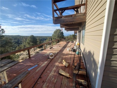 Mt. Wilson cabin on 5.11 acres with incredible views!! There are