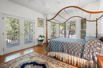 Set against a breathtaking Lowcountry backdrop, this stately - photo 18