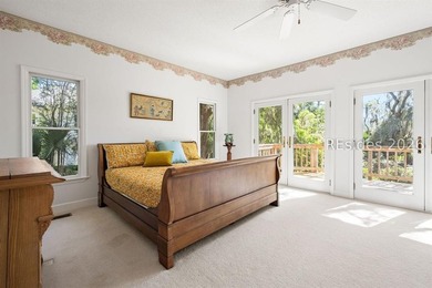 Set against a breathtaking Lowcountry backdrop, this stately - photo 22