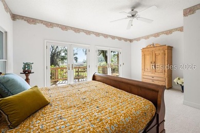 Set against a breathtaking Lowcountry backdrop, this stately - photo 23