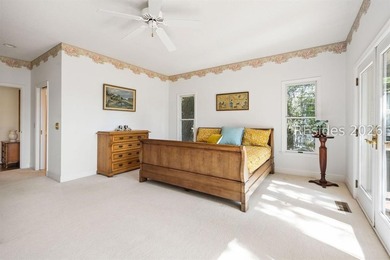 Set against a breathtaking Lowcountry backdrop, this stately - photo 24