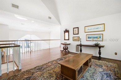 Set against a breathtaking Lowcountry backdrop, this stately - photo 39