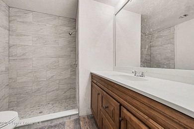Situated on a FULL ACRE in lovely North Merritt Island, this - photo 4
