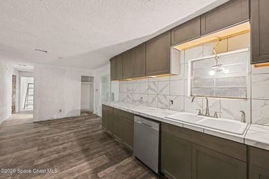 Situated on a FULL ACRE in lovely North Merritt Island, this - photo 7