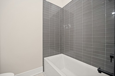 Located in Irving Park, this oversized 3-bed, 2-bath unit offers