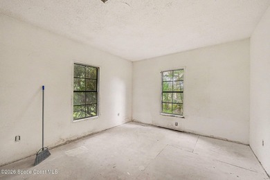 Situated on a FULL ACRE in lovely North Merritt Island, this - photo 9