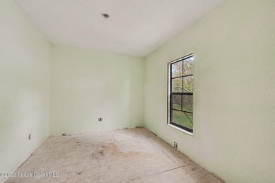 Situated on a FULL ACRE in lovely North Merritt Island, this - photo 10