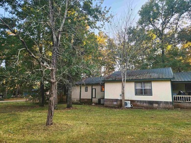 Nestled in a peaceful lakefront community in Trinity, Texas - photo 3