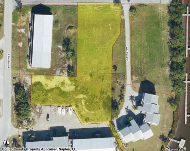 One acre commercial vacant lot with 6 docks giving access to the - photo 1