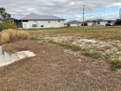 Vacant waterfront lot in a quiet NW Cape Coral neighborhood. An - photo 8