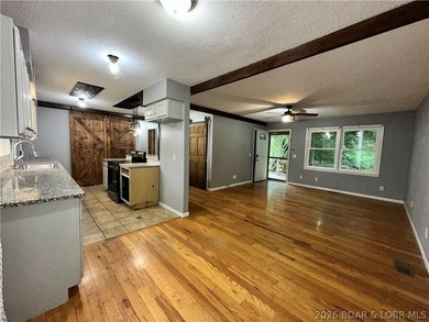 4-bed, 2-bath home in Warsaw featuring an open floor plan - photo 11