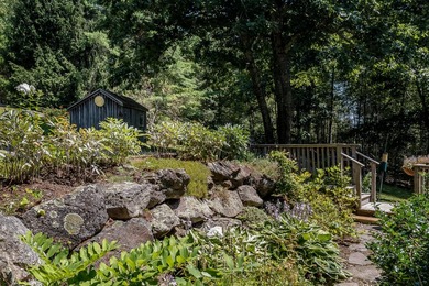 Charming contemporary cape on 2.7 south-facing acres in private - photo 15