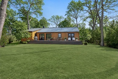 Tucked within a private waterfront enclave on a beautiful - photo 13