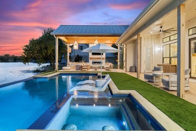 Nestled on a serene 0.60-acre peninsula on Lake LBJ, 703 - photo 4