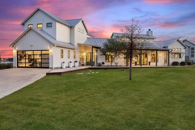 Nestled on a serene 0.60-acre peninsula on Lake LBJ, 703 - photo 10