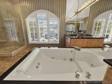 Nestled on a private corner lot within the prestigious gated - photo 11