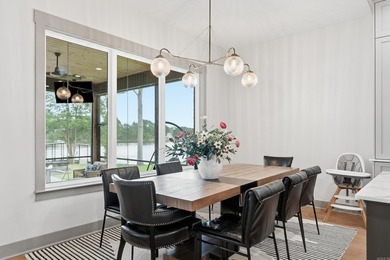 Luxury lake living awaits inside the gated Pointe at Hurricane - photo 17