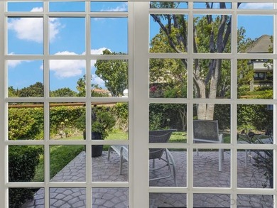 Nestled on a private corner lot within the prestigious gated - photo 18