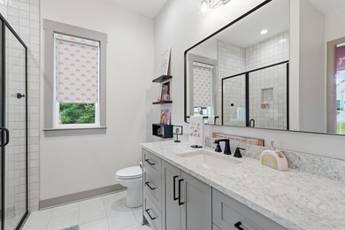 Luxury lake living awaits inside the gated Pointe at Hurricane - photo 32
