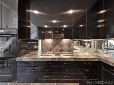 Nestled on a private corner lot within the prestigious gated - photo 42