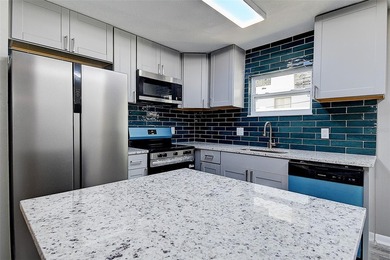 Welcome home to this beautifully renovated 3 bedroom, 2 bathroom - photo 8
